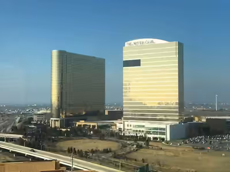The gold glass tower of Borgata and its second tower in 2016, when that tower still carried the sign The Water Club